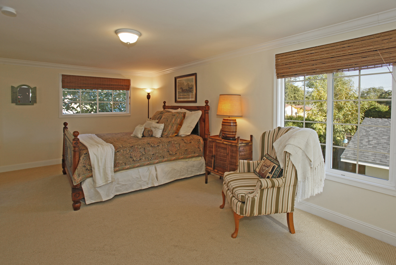 1290 Vallecito Road Carpinteria, CA 93013 - Photo 6 of 12 a living room with furniture and a large window
