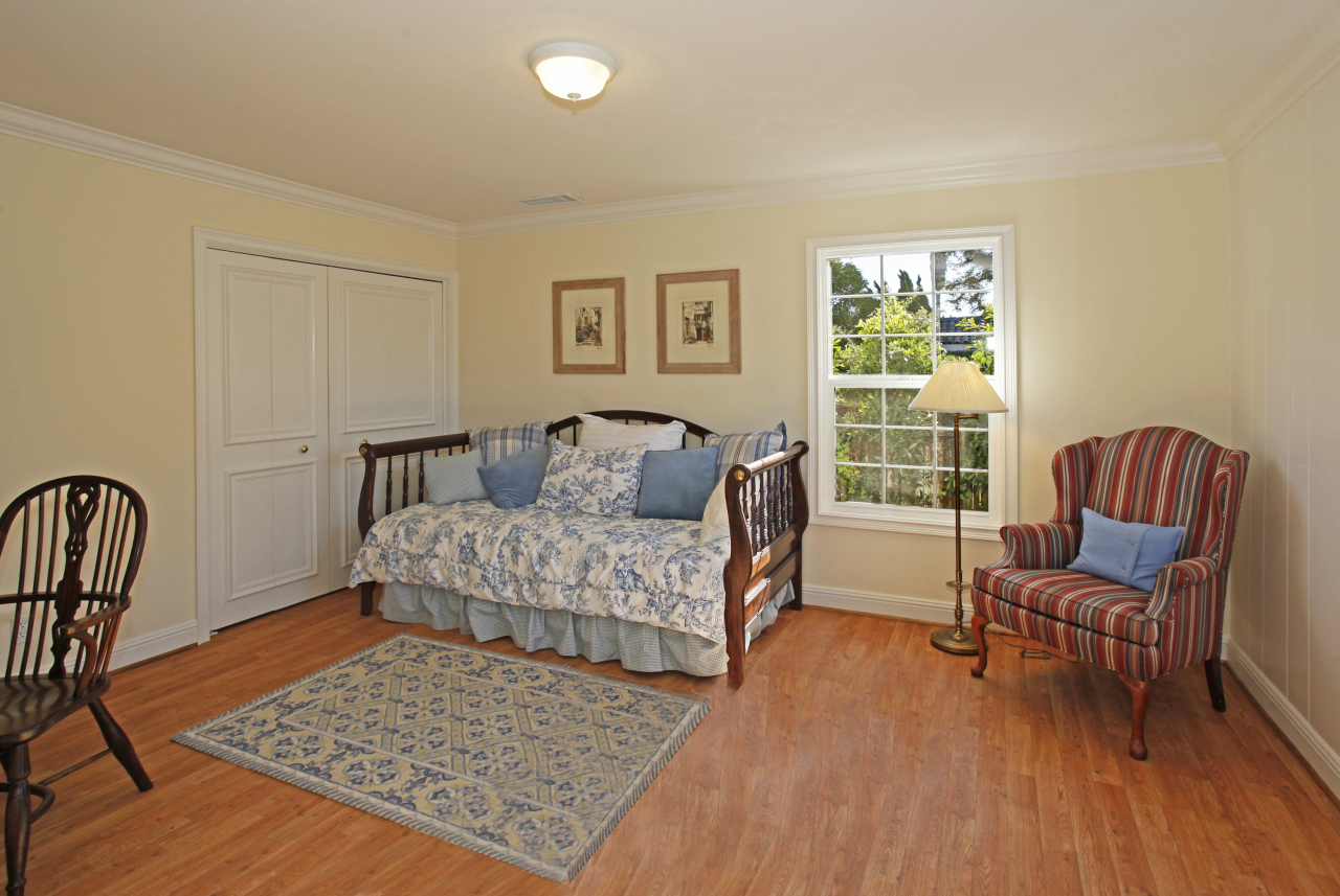 1290 Vallecito Road Carpinteria, CA 93013 - Photo 10 of 12 a living room with furniture and a rug