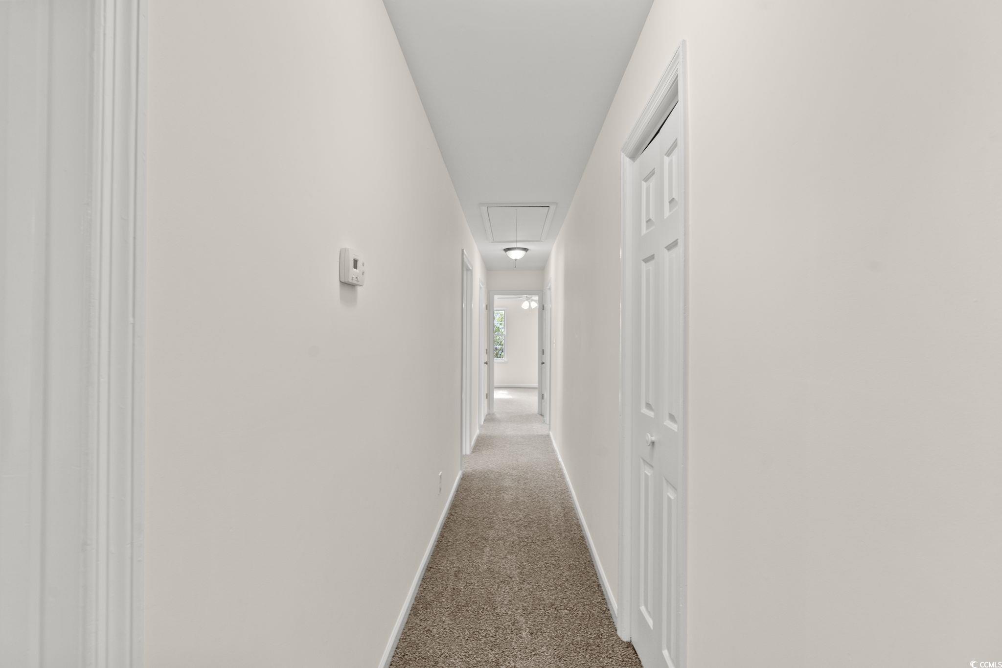 83 Pond Street Georgetown, SC 29440 - Photo 15 of 36 Kitchen with stainless steel appliances, white cabinets, recessed lighting, granite countertops and decorative light fixtures