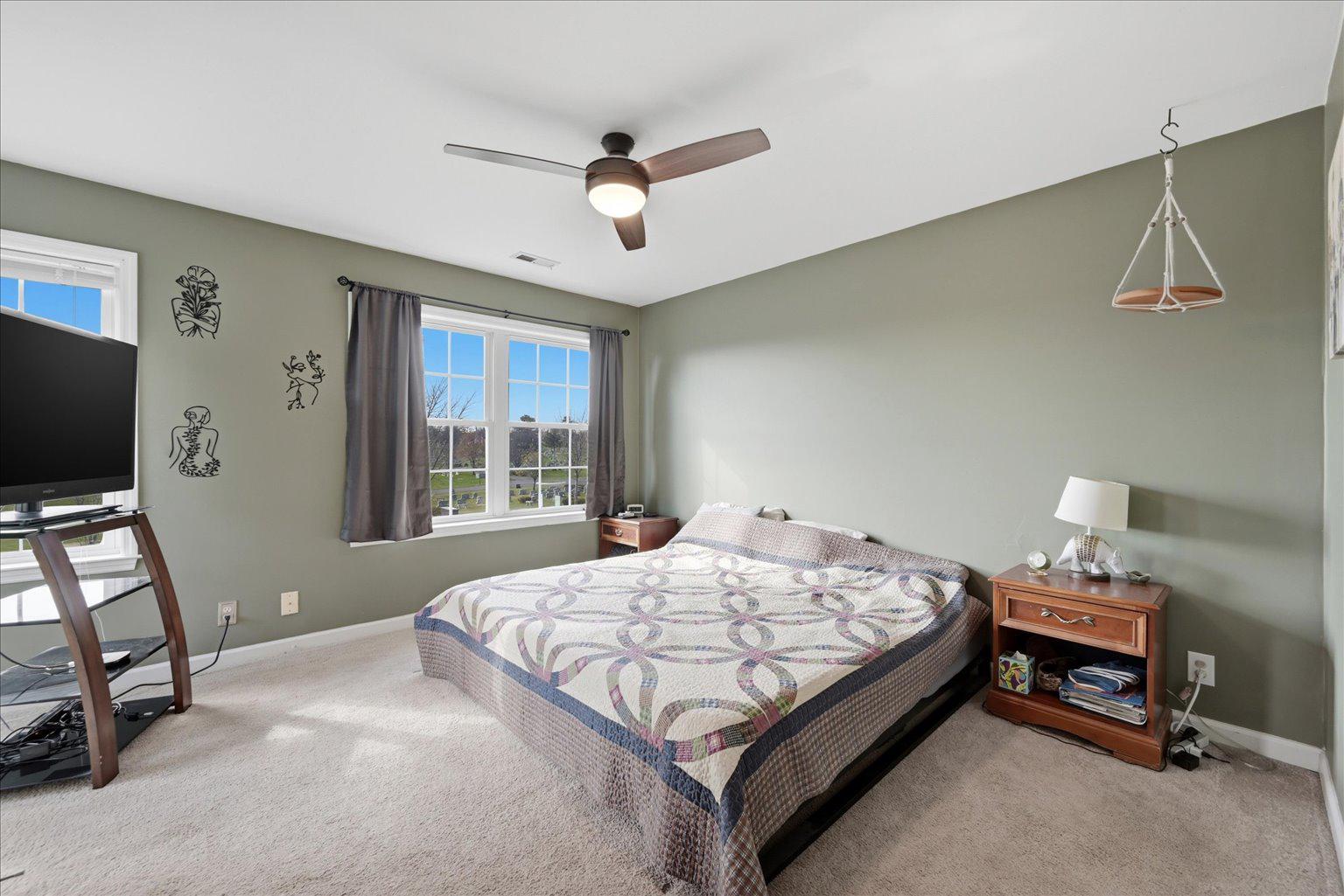 16 South Pleasant Valley Road Winchester, VA 22601 - Photo 22 of 34 Serene spacious primary bedroom with natural light