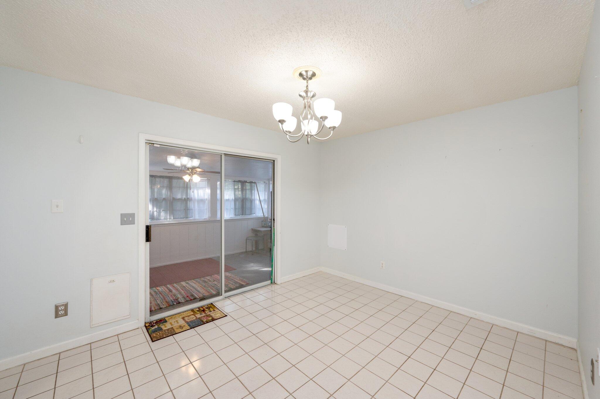 9 Holly Road Crestview, FL 32539 - Photo 12 of 32 a view of a chandelier fan and entryway