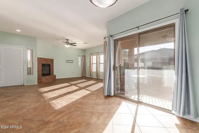 a view of an empty room and window