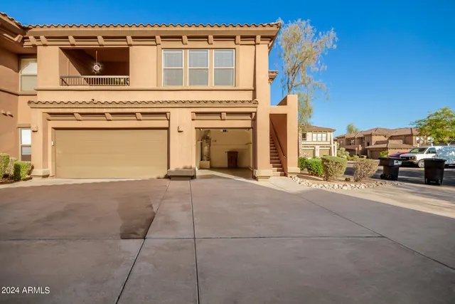 a view of a house with a street