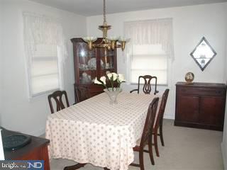 432 Barker Road Springfield, PA 19064 - Photo 3 of 6 a dining room with furniture and window
