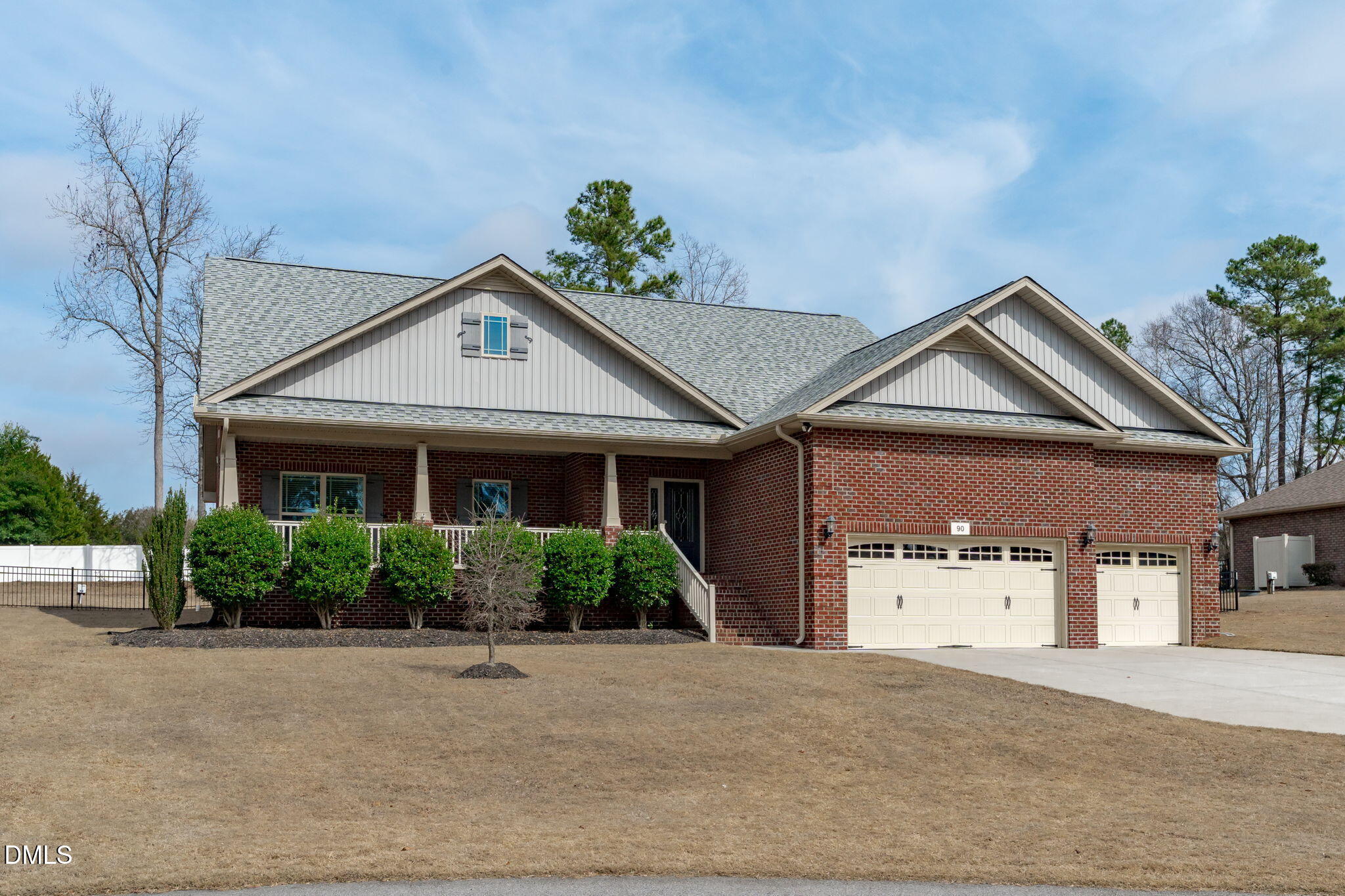 90 Cypress Ridge Way. Willow Spring, NC 27592 - Photo 1 of 52 front view of a house with a street