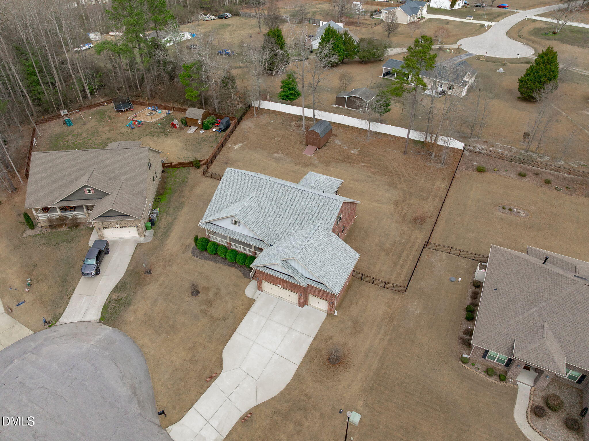 90 Cypress Ridge Way. Willow Spring, NC 27592 - Photo 2 of 52 an aerial view of a house with a yard