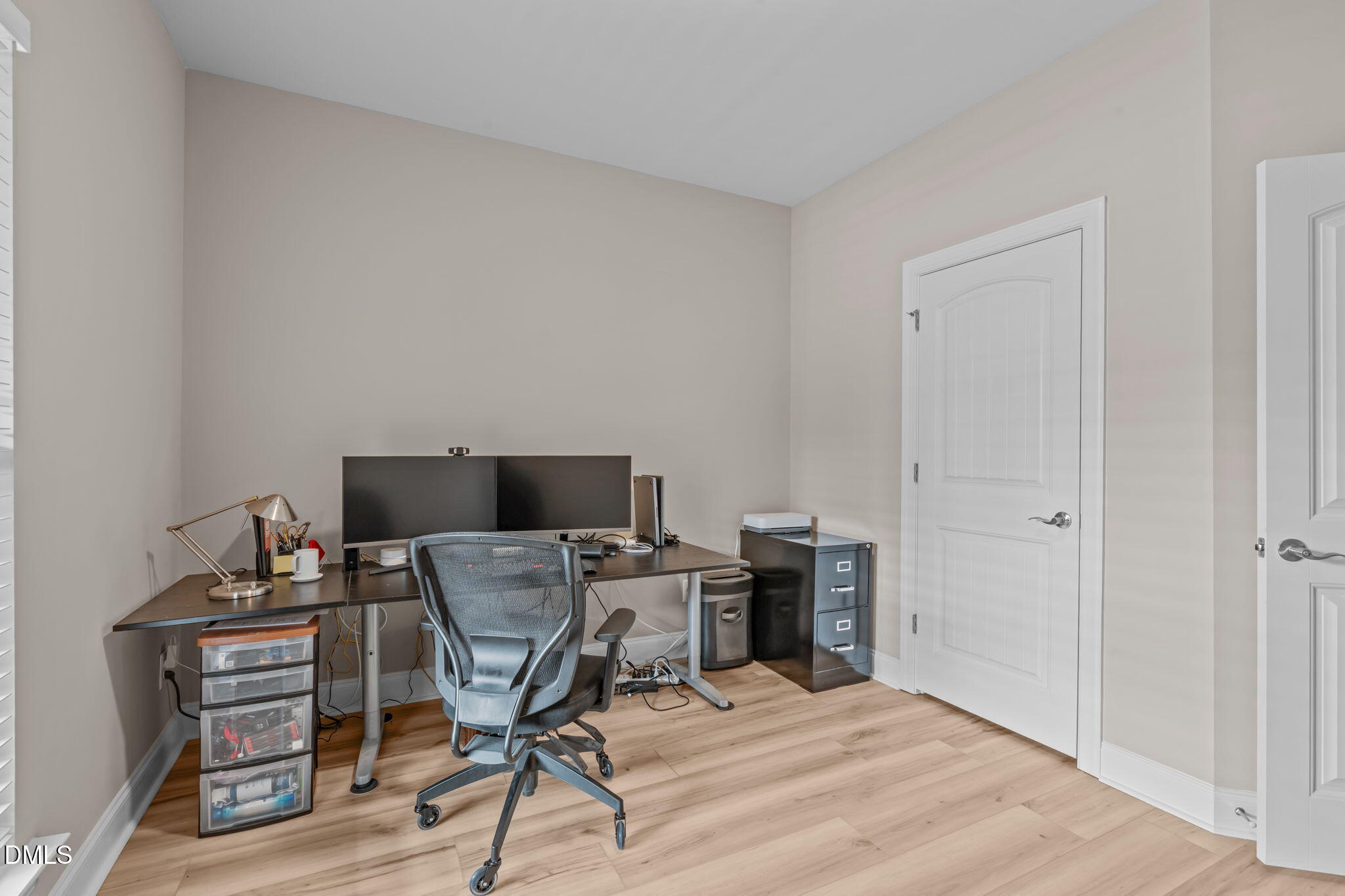 90 Cypress Ridge Way. Willow Spring, NC 27592 - Photo 21 of 52 a workspace with furniture and wooden floor