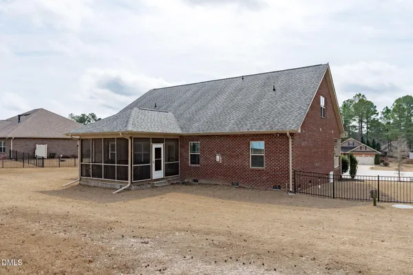 front view of a house with a small yard