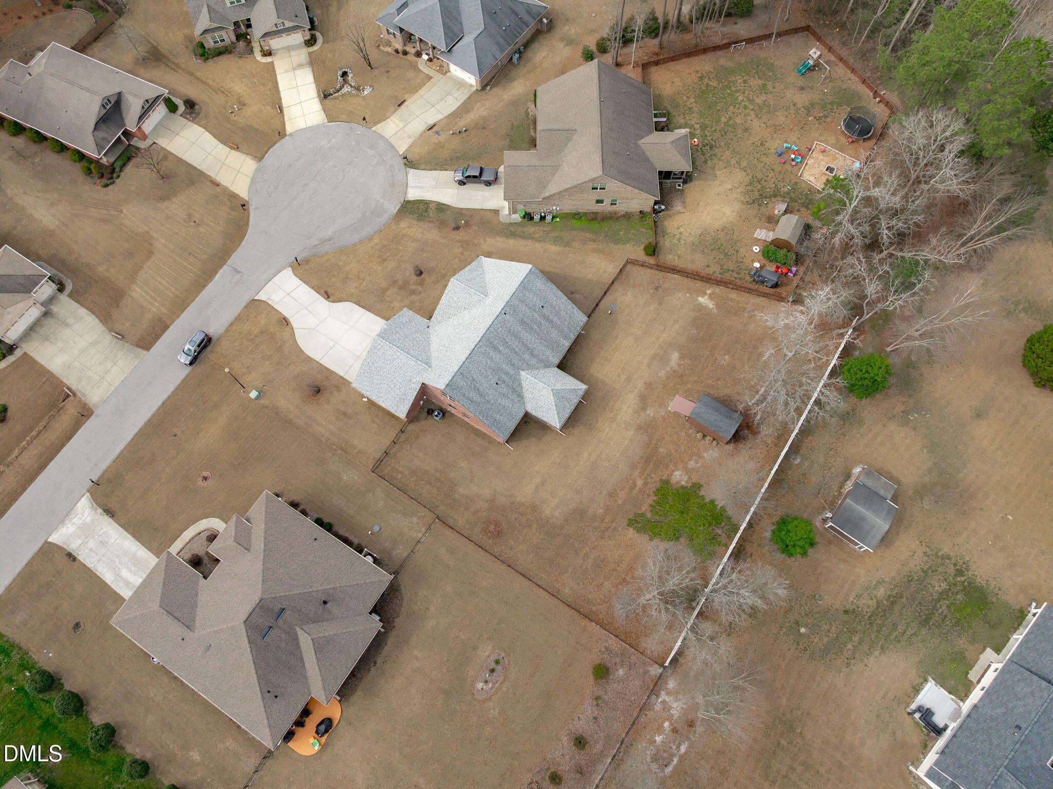90 Cypress Ridge Way. Willow Spring, NC 27592 - Photo 36 of 52 an aerial view of a house with outdoor space