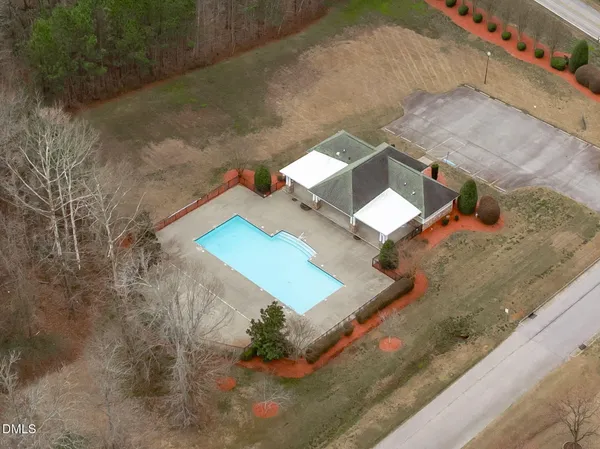 an aerial view of residential house with outdoor space