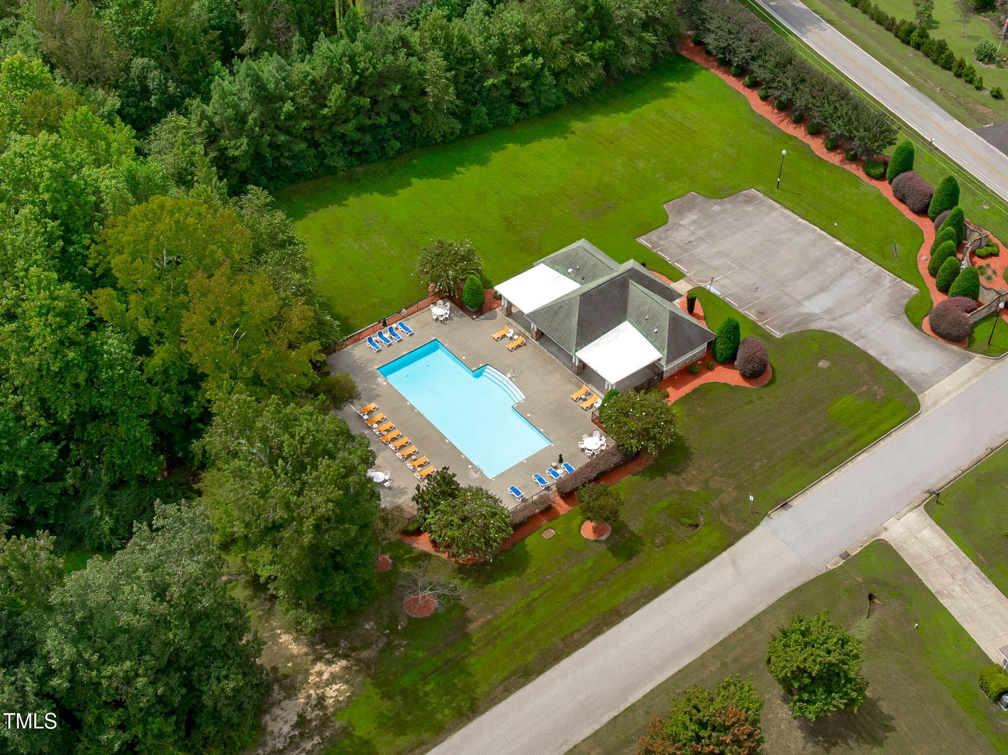 90 Cypress Ridge Way. Willow Spring, NC 27592 - Photo 49 of 52 an aerial view of a house with a yard