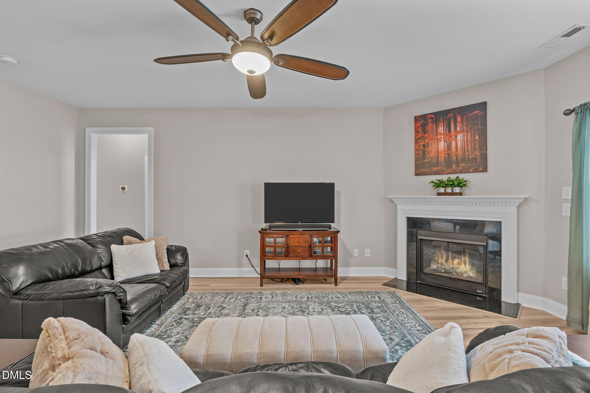 90 Cypress Ridge Way. Willow Spring, NC 27592 - Photo 6 of 52 a living room with furniture and a fireplace