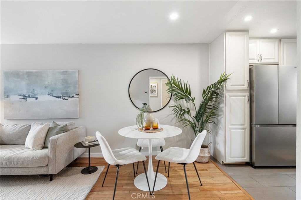 61 Pixley Avenue, Unit 3 Corte Madera, CA 94925 - Photo 5 of 17 a living room with furniture and a mirror