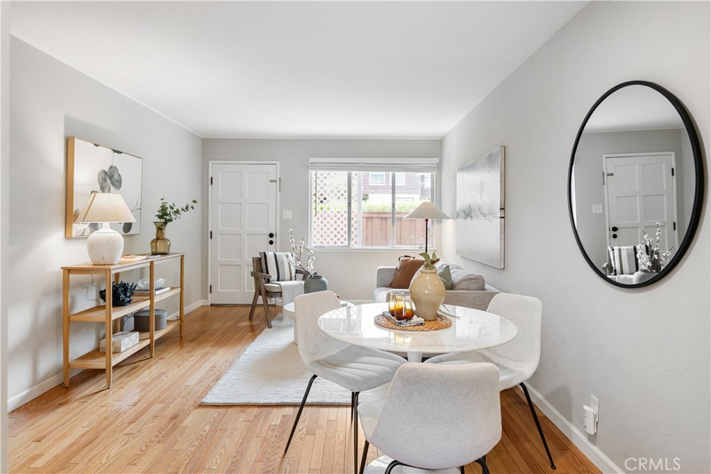 61 Pixley Avenue, Unit 3 Corte Madera, CA 94925 - Photo 6 of 17 a view of a dining room with furniture and a window