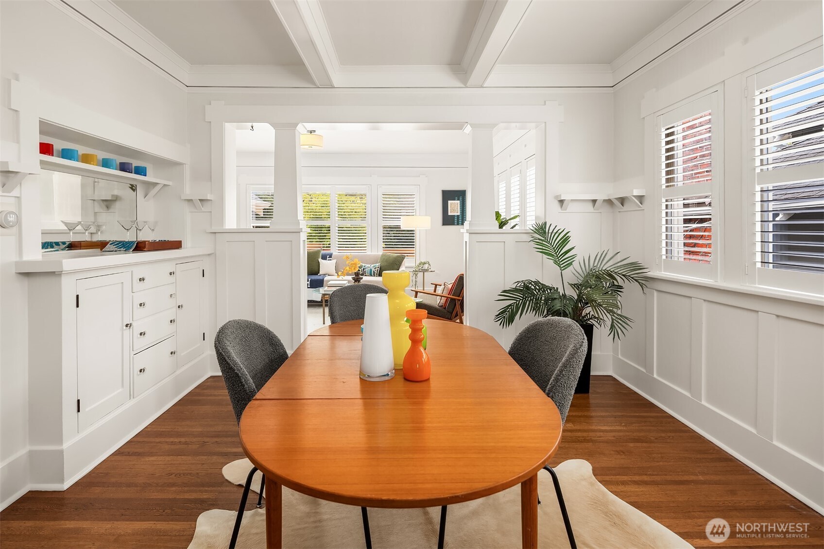 914 West Howe Street Seattle, WA 98119 - Photo 12 of 29 a dining room with furniture and wooden floor