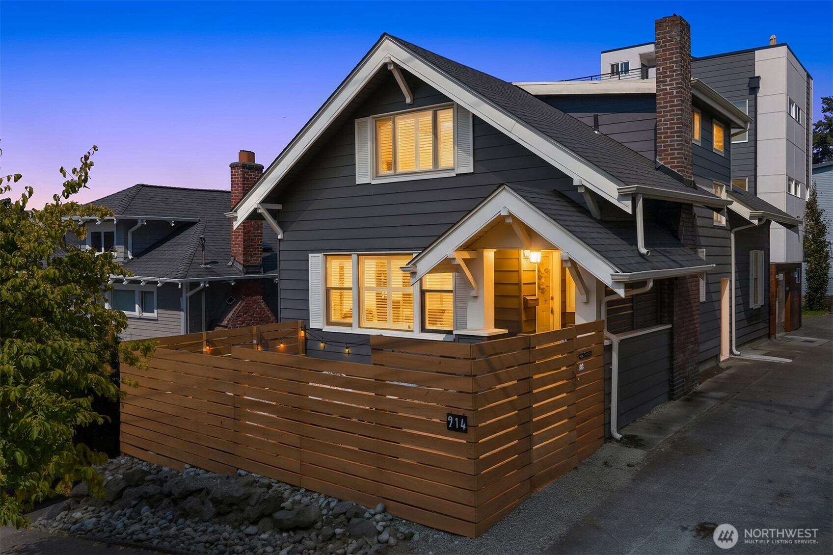 914 West Howe Street Seattle, WA 98119 - Photo 2 of 29 a view of a house with a yard