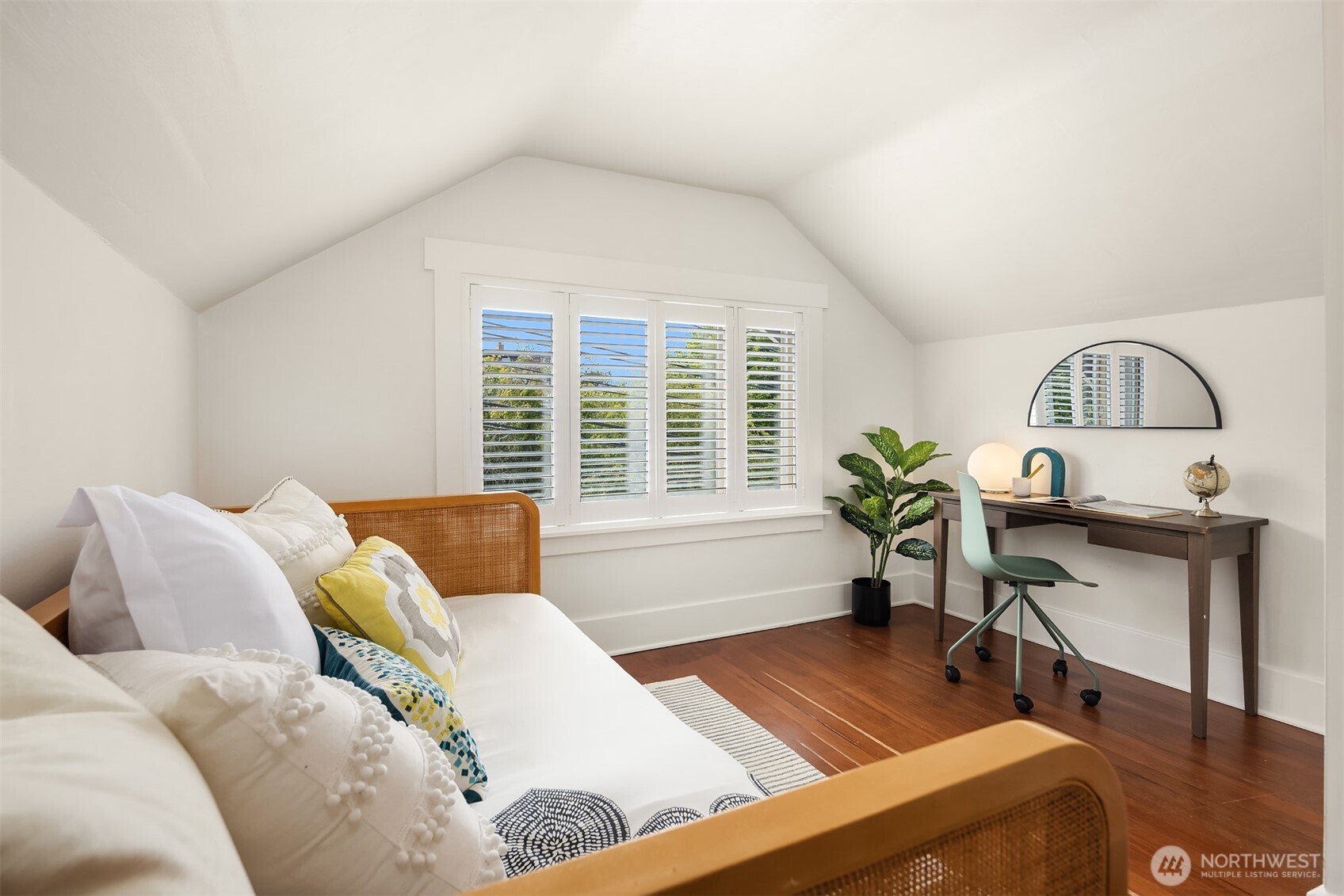 914 West Howe Street Seattle, WA 98119 - Photo 21 of 29 a living room with furniture and a potted plant
