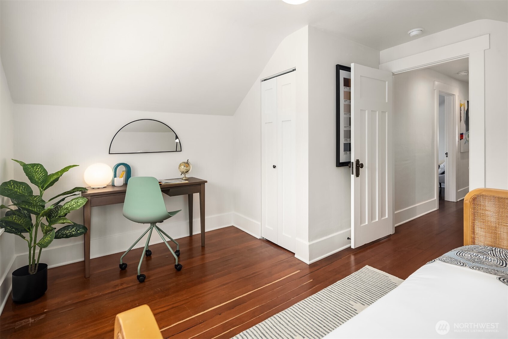 914 West Howe Street Seattle, WA 98119 - Photo 22 of 29 a living room with furniture and a potted plant