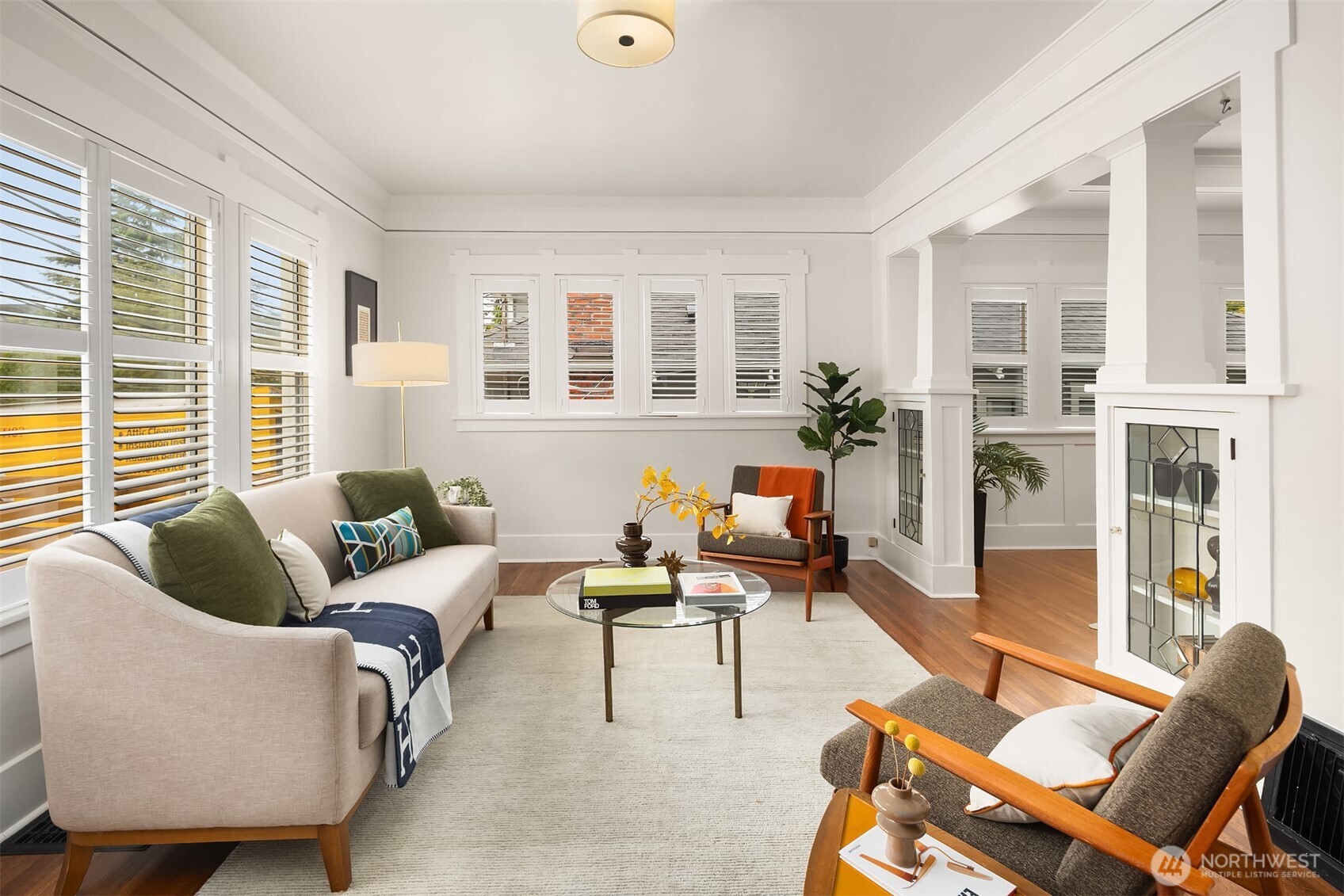 914 West Howe Street Seattle, WA 98119 - Photo 5 of 29 a living room with furniture and a large window