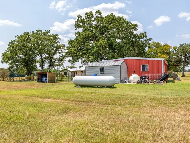 a front view of a house with yard