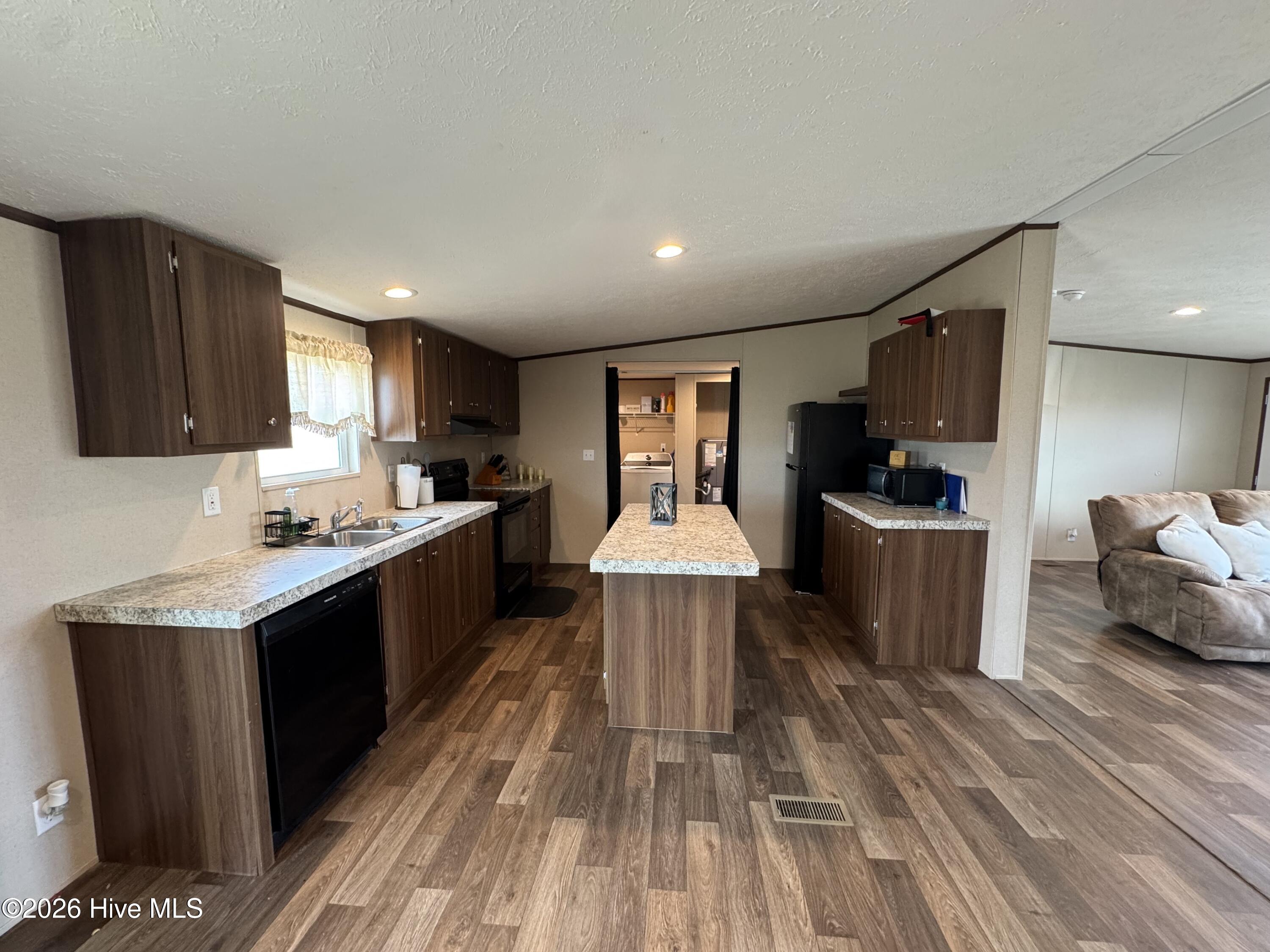 4377 McGirt Road Maxton, NC 28364 - Photo 9 of 18 Kitchen View From Dining Room