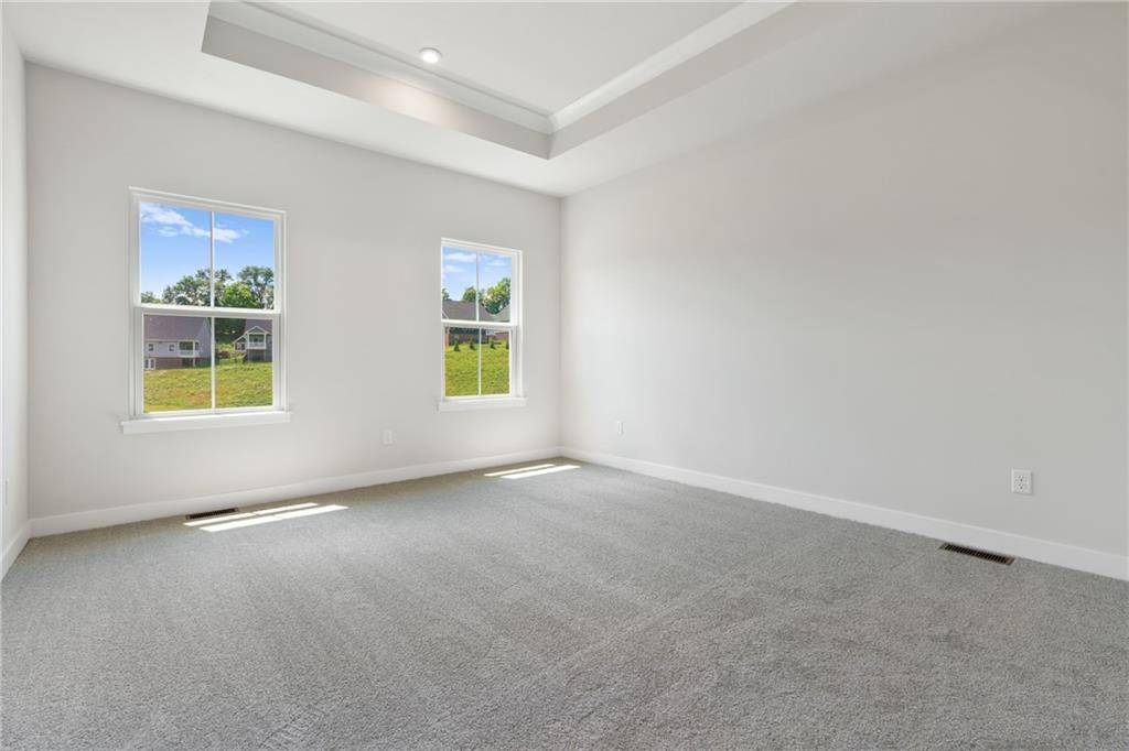 113 Olivia Drive Eighty Four, PA 15330 - Photo 17 of 29 an empty room with windows and entrance