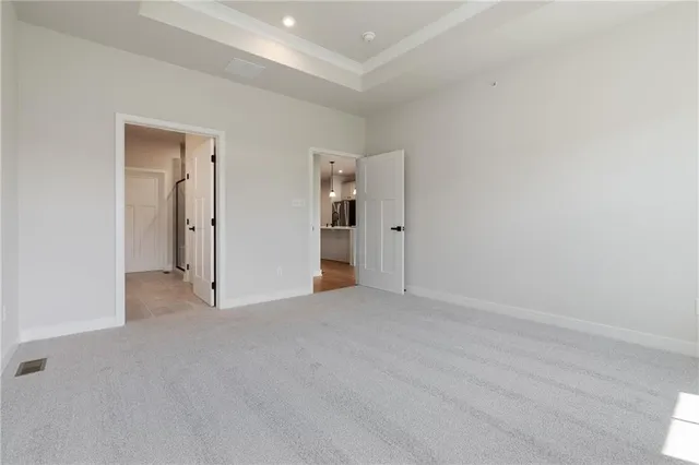 a view of an empty room and closet
