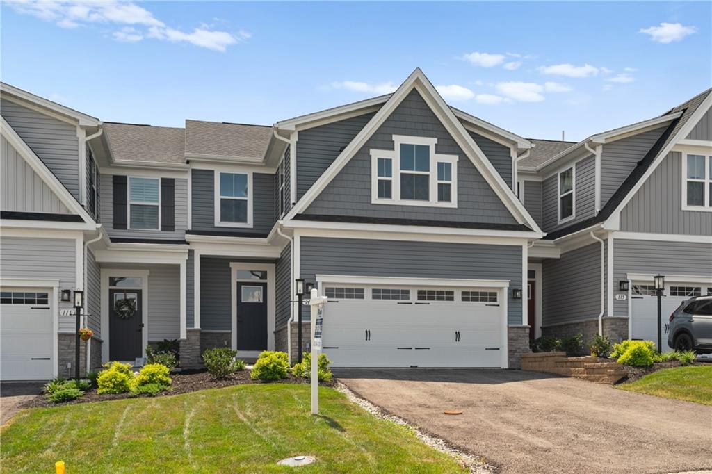 113 Olivia Drive Eighty Four, PA 15330 - Photo 2 of 29 a front view of a house with garden
