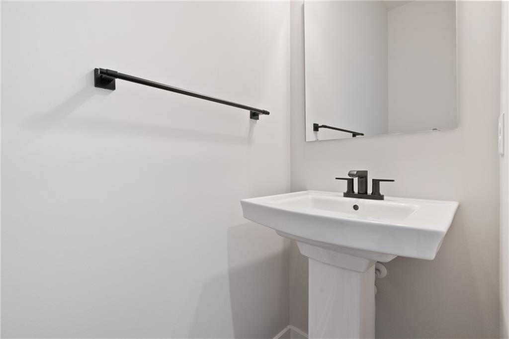 113 Olivia Drive Eighty Four, PA 15330 - Photo 24 of 29 a bathroom with a sink and mirror