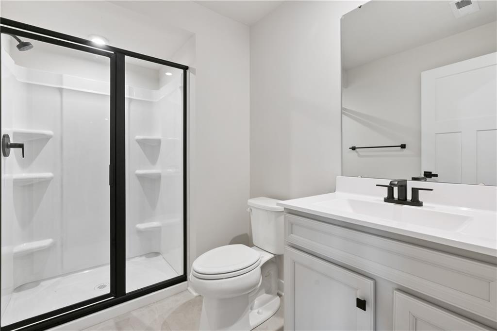 113 Olivia Drive Eighty Four, PA 15330 - Photo 25 of 29 a bathroom with a sink a toilet and shower