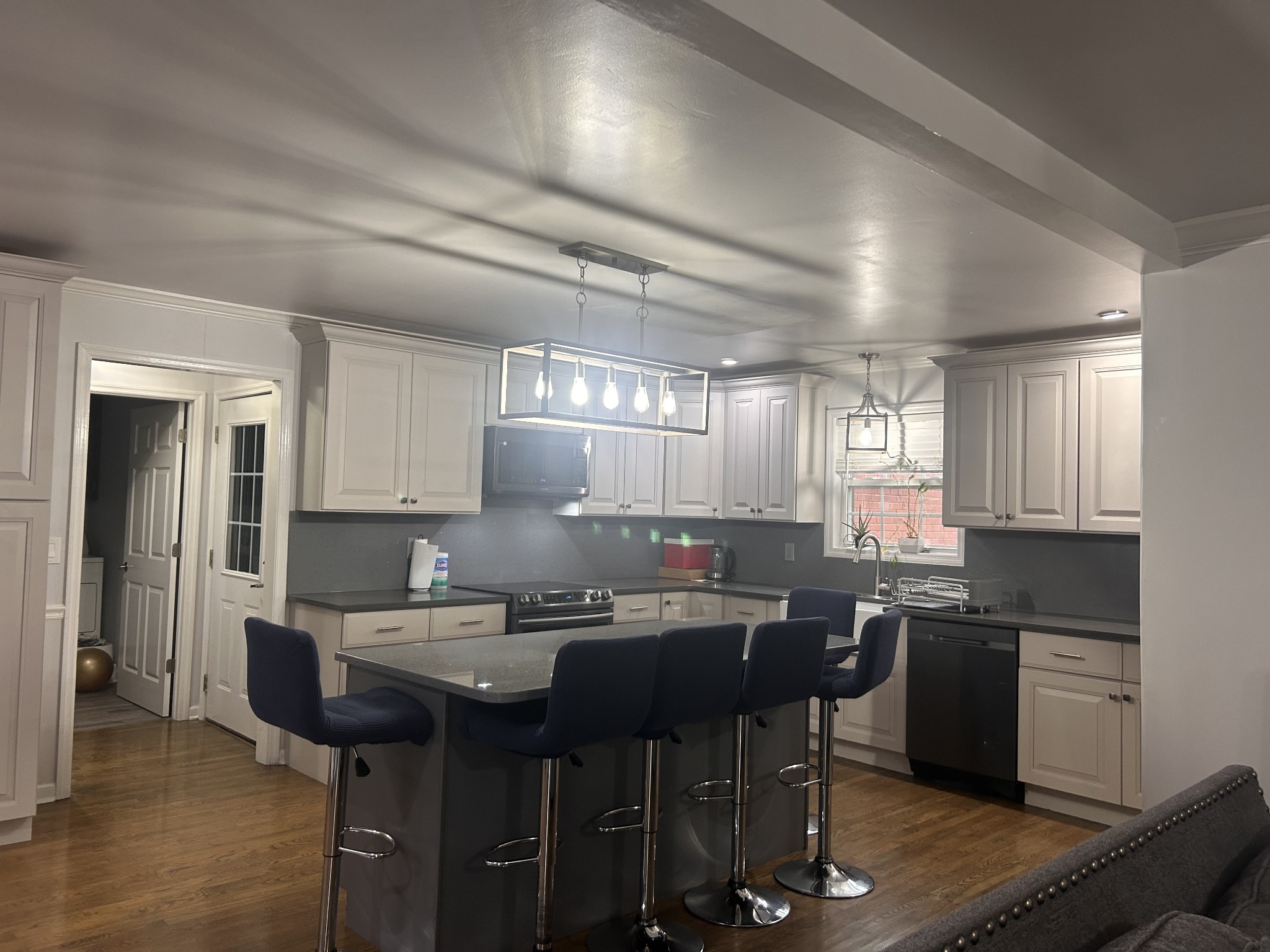 2200 Crescentview Road Pulaski, TN 38478 - Photo 13 of 72 a kitchen with a sink a stove a dining table and chairs