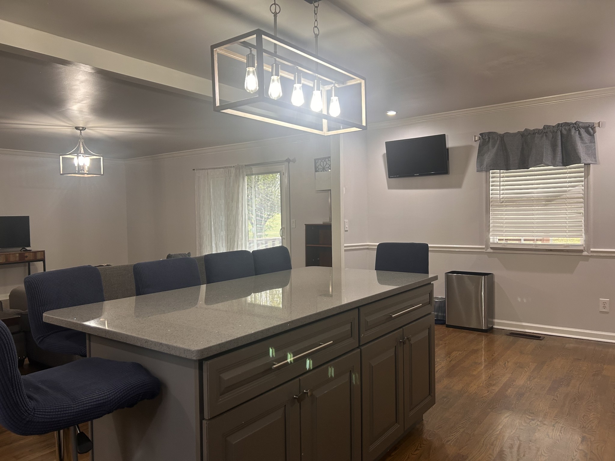 2200 Crescentview Road Pulaski, TN 38478 - Photo 14 of 72 a kitchen with a table chairs refrigerator and microwave