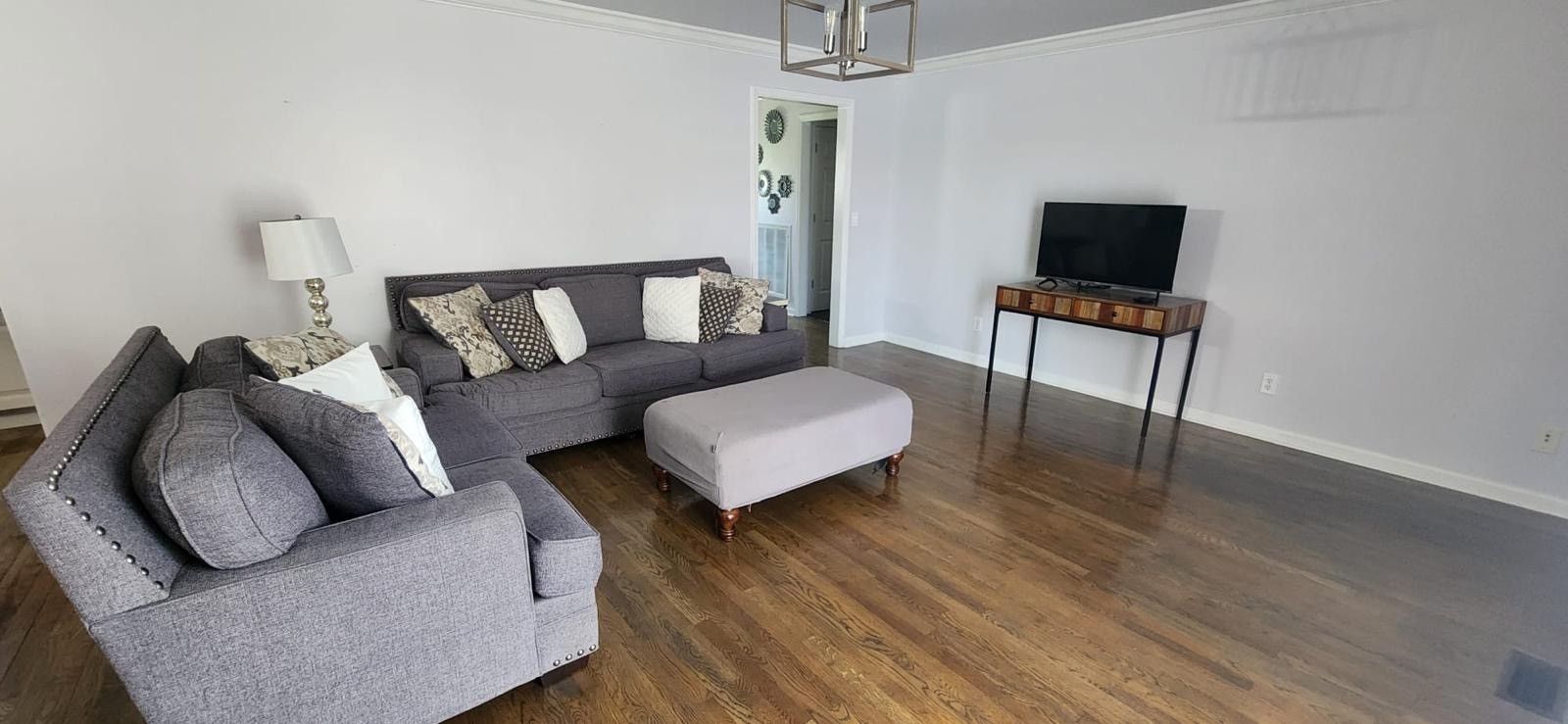 2200 Crescentview Road Pulaski, TN 38478 - Photo 22 of 72 a living room with furniture and a flat screen tv