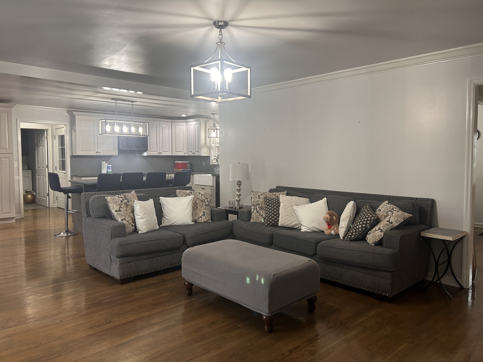 2200 Crescentview Road Pulaski, TN 38478 - Photo 23 of 72 a living room with furniture and a chandelier