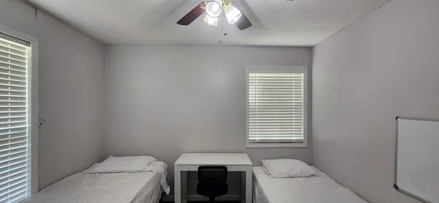 a house with yard in front of it