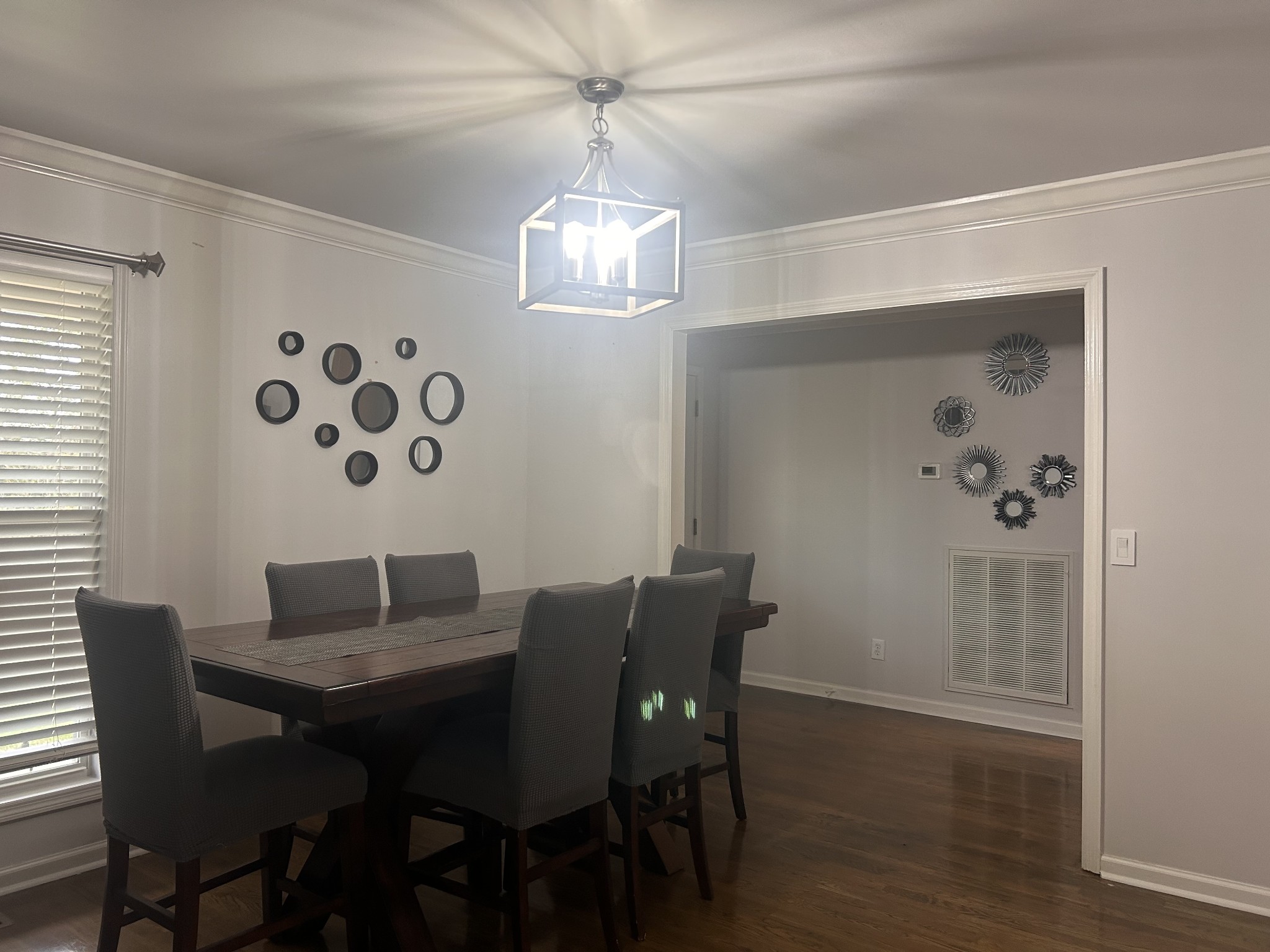 2200 Crescentview Road Pulaski, TN 38478 - Photo 10 of 72 a view of a dining room with furniture wooden floor and a chandelier
