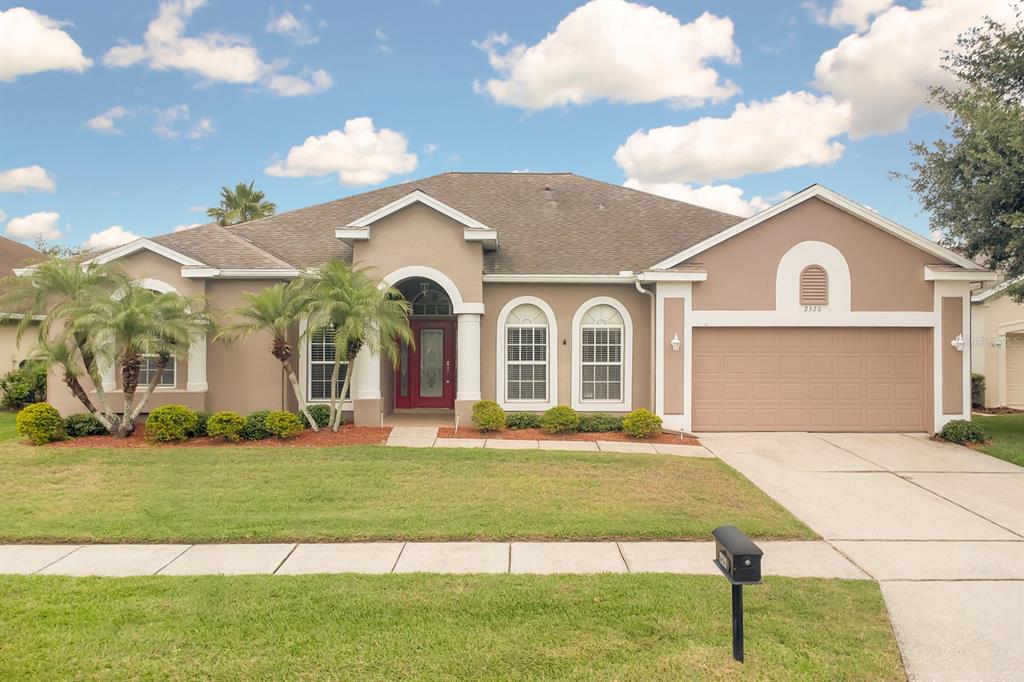 2320 Post Oak Court Ocoee, FL 34761 - Photo 1 of 1 a front view of a house with a yard