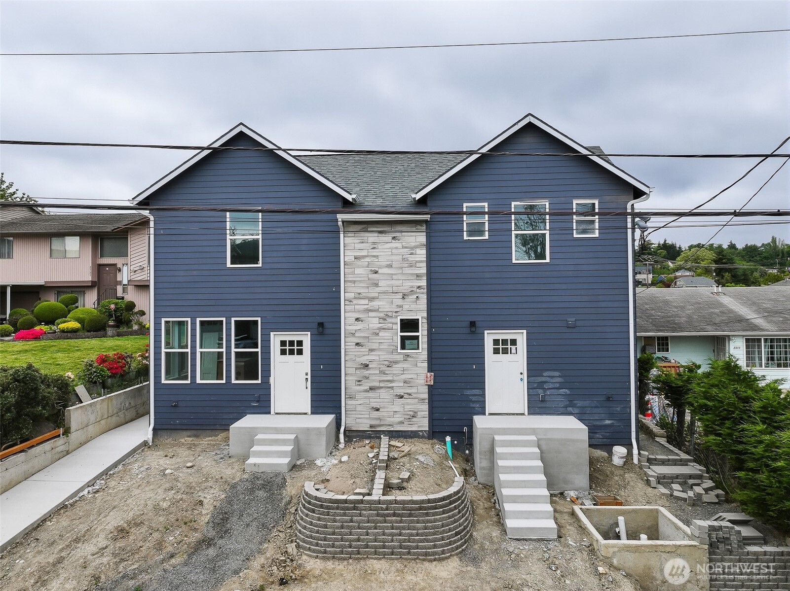 2317 22nd Avenue South Seattle, WA 98144 - Photo 2 of 29 a front view of a house with a yard