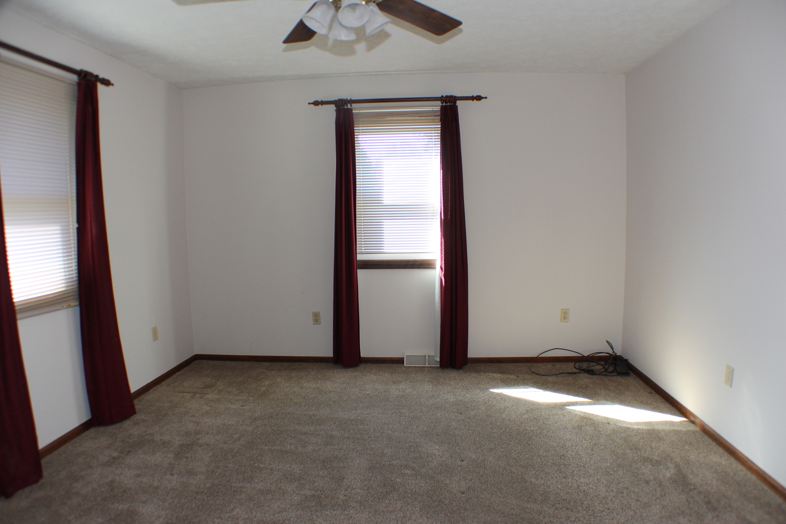 8 Apache Court Eldridge, IA 52748 - Photo 11 of 29 an empty room with a window