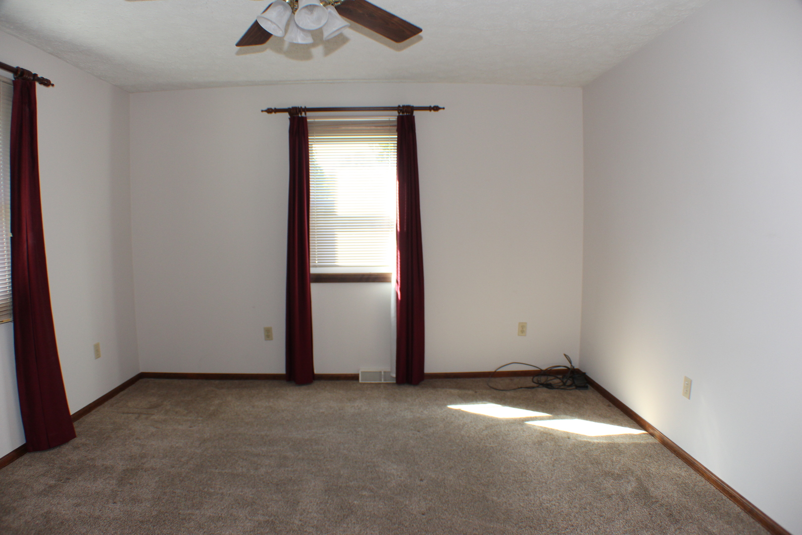 8 Apache Court Eldridge, IA 52748 - Photo 12 of 29 an empty room with a window
