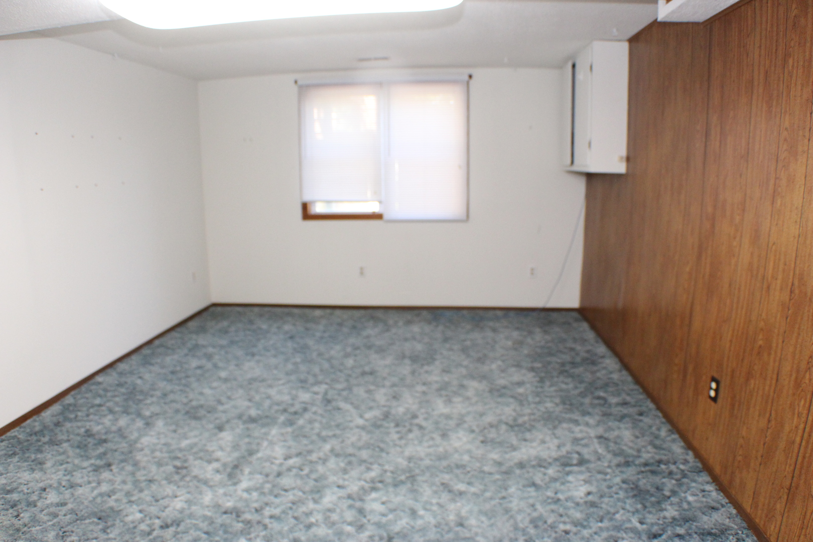 8 Apache Court Eldridge, IA 52748 - Photo 18 of 29 an empty room with a window