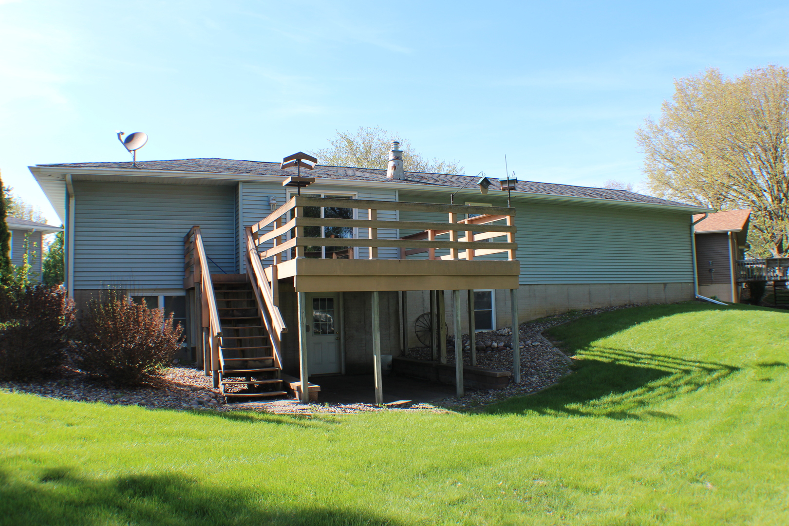 8 Apache Court Eldridge, IA 52748 - Photo 25 of 29 a view of a house with patio and a yard