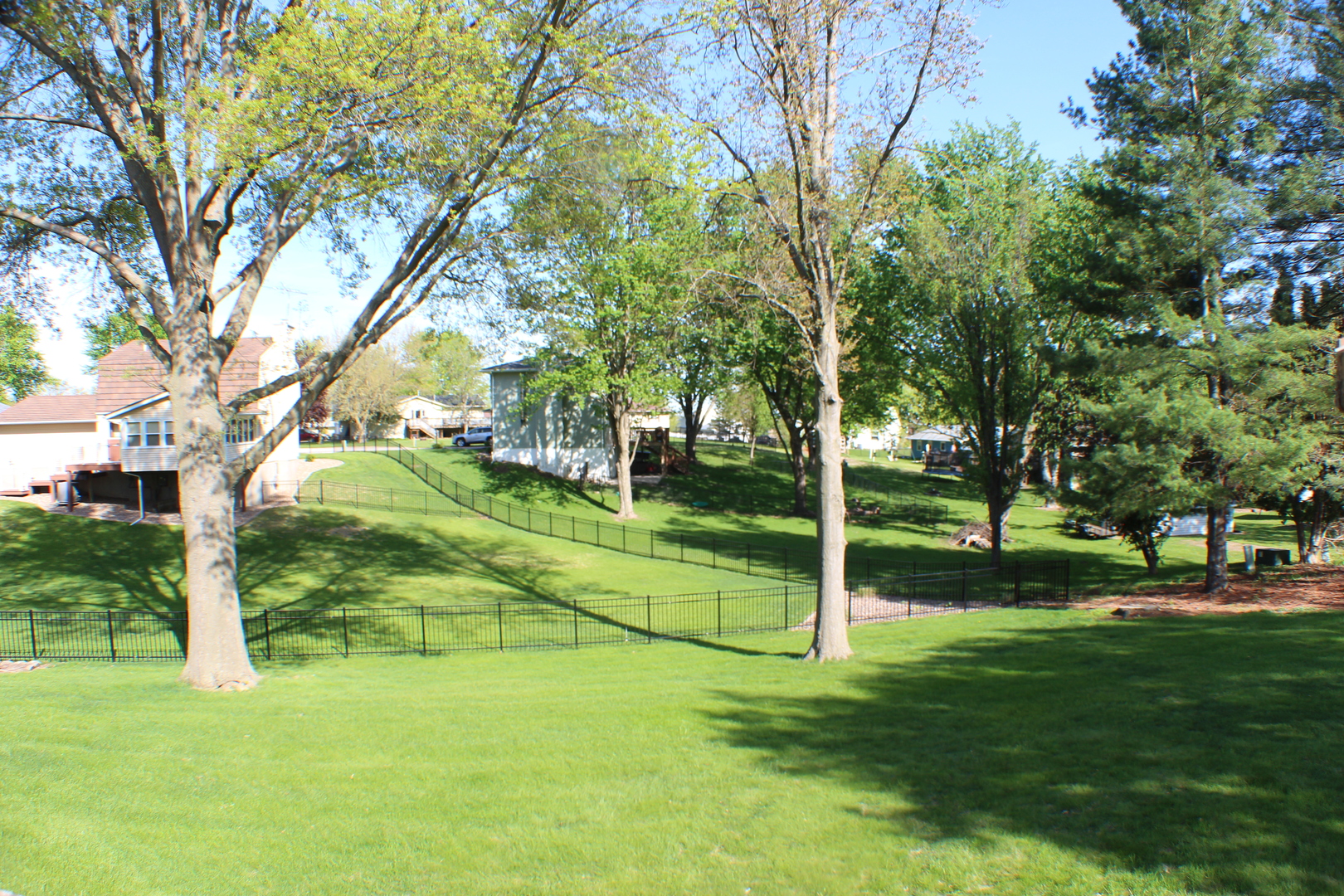 8 Apache Court Eldridge, IA 52748 - Photo 28 of 29 a view of a park with large trees