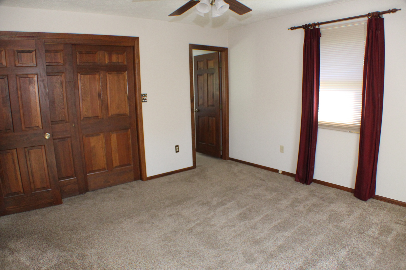 8 Apache Court Eldridge, IA 52748 - Photo 10 of 29 an empty room with closet and a hallway