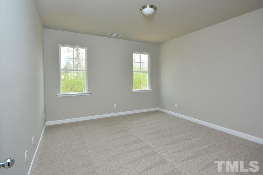 60 Mae Court Roxboro, NC 27573 - Photo 8 of 10 an empty room with windows