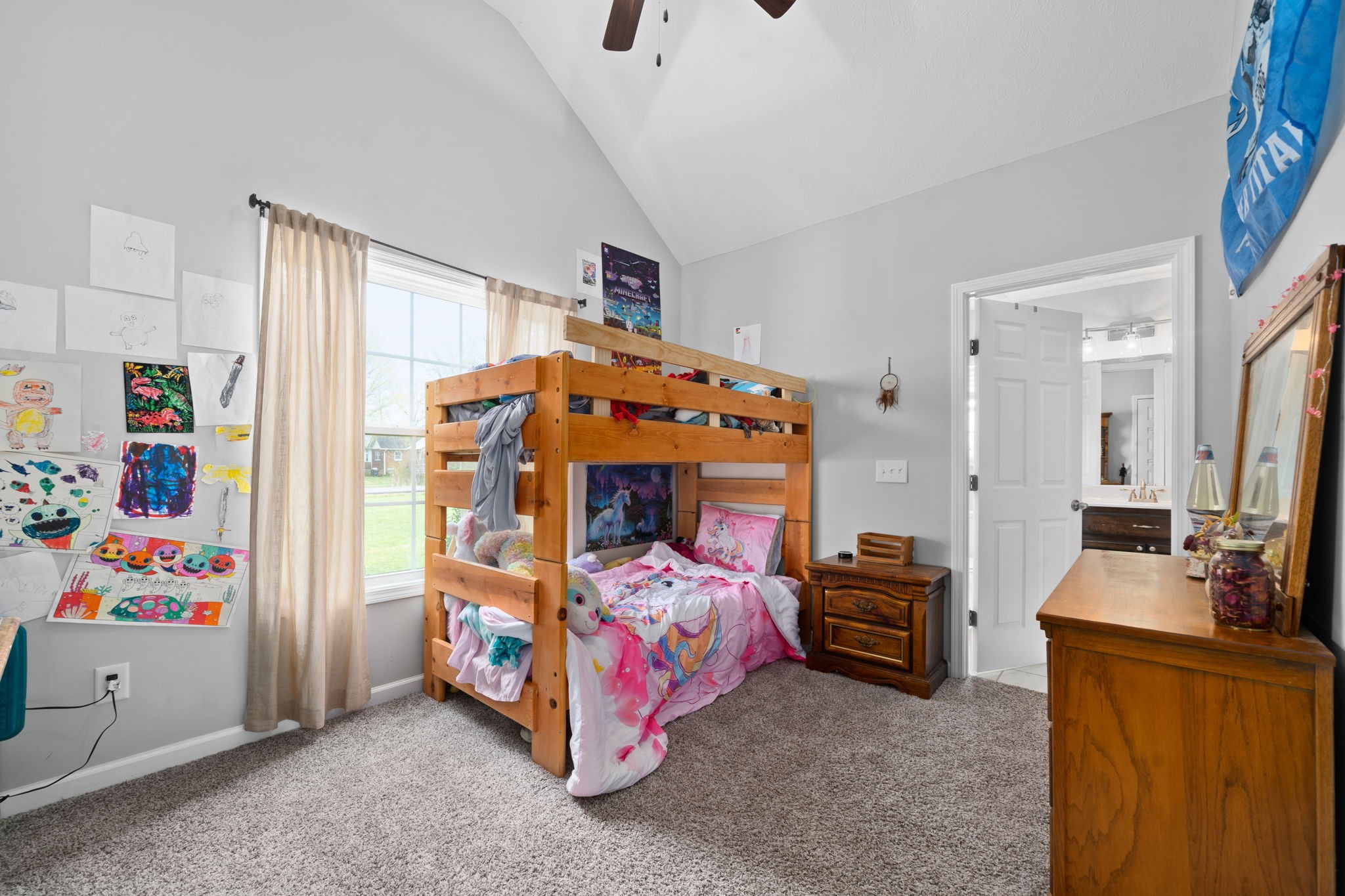 209 Northup Road Portland, TN 37148 - Photo 19 of 39 a bedroom with a bed and a tv