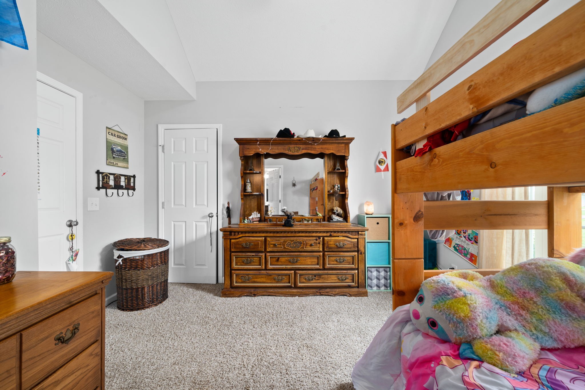209 Northup Road Portland, TN 37148 - Photo 20 of 39 a bedroom with a bed and a cabinet