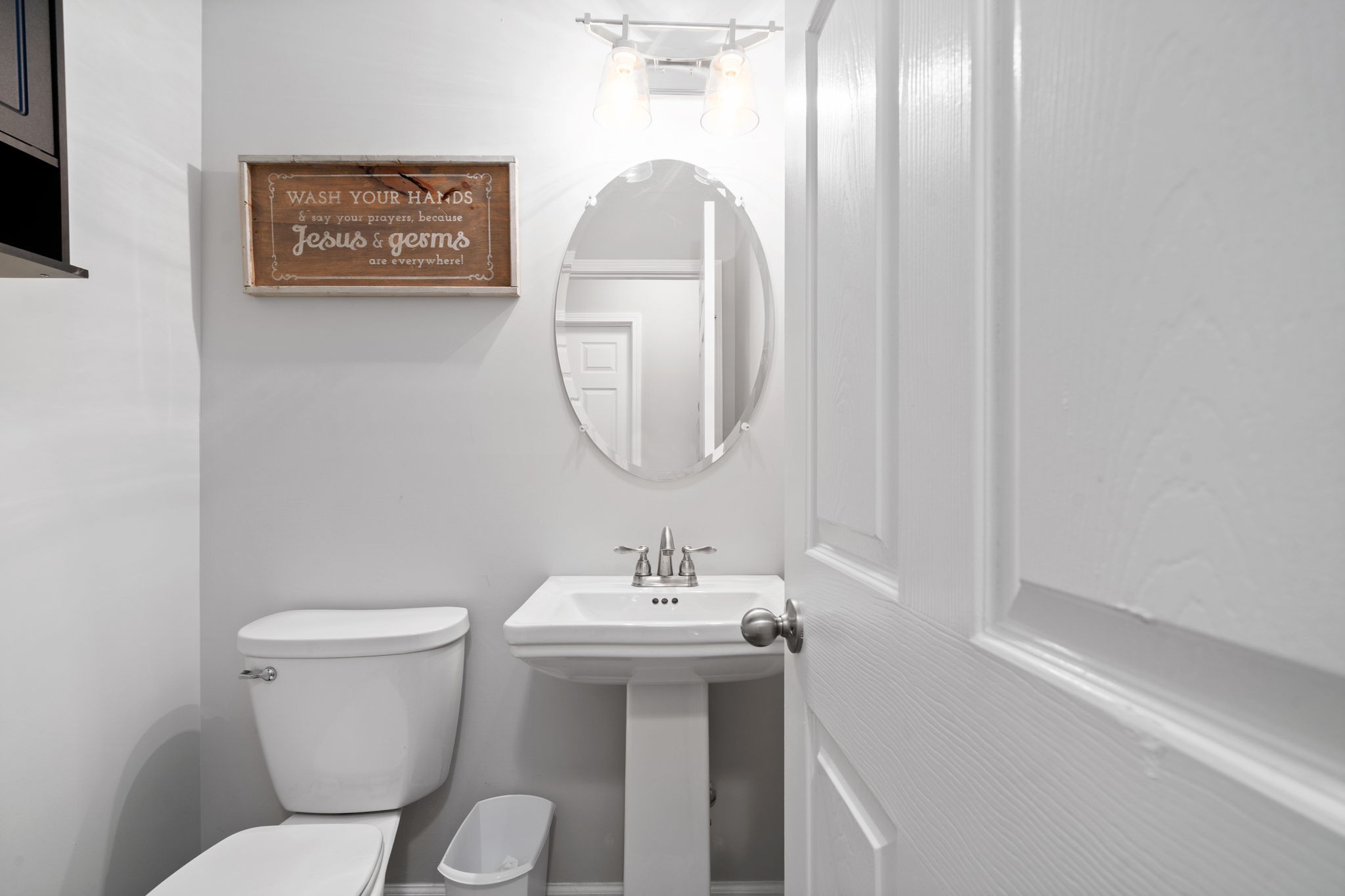 209 Northup Road Portland, TN 37148 - Photo 24 of 39 a bathroom with a toilet sink and mirror