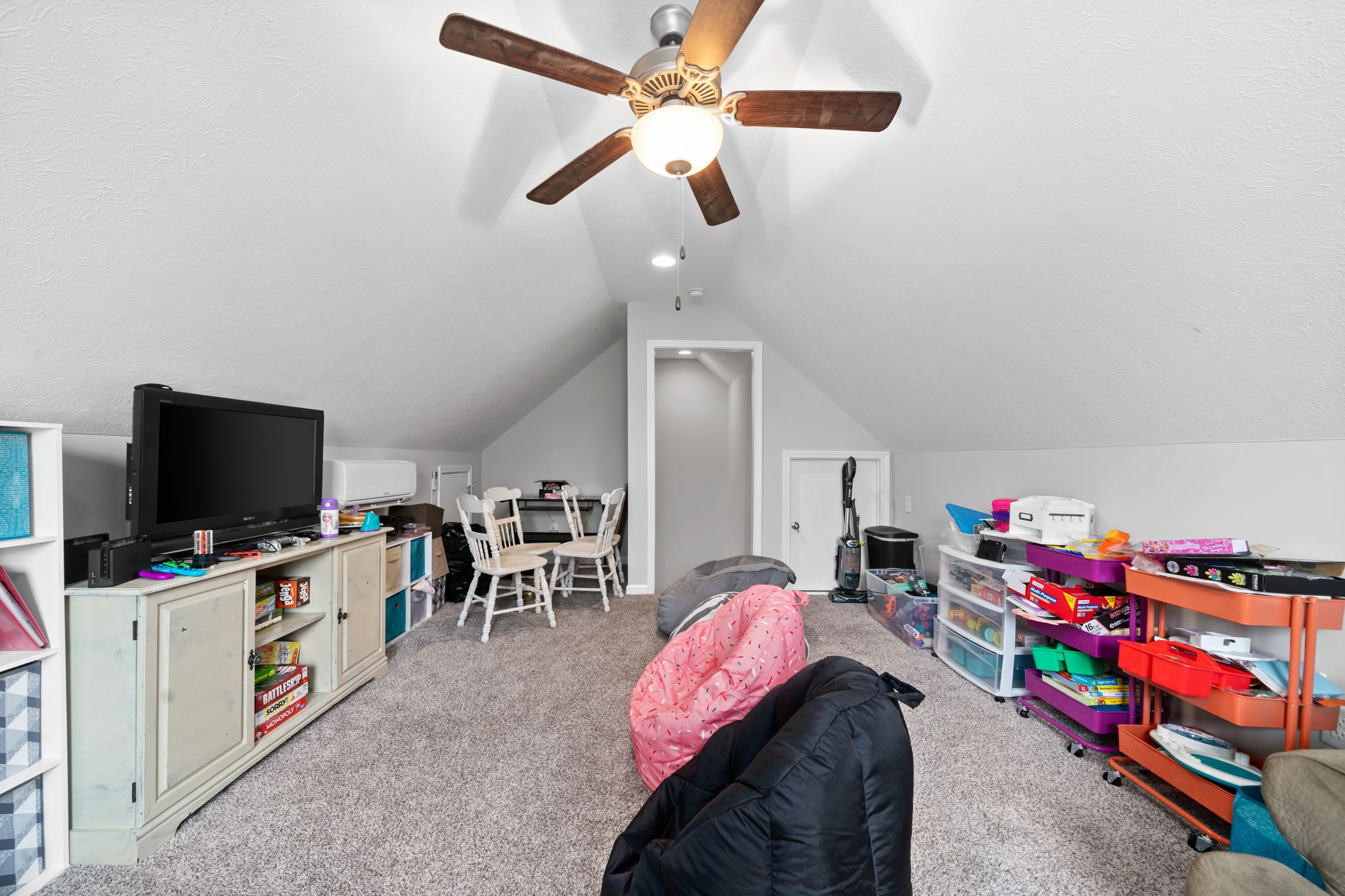 209 Northup Road Portland, TN 37148 - Photo 26 of 39 a living room with furniture and a flat screen tv