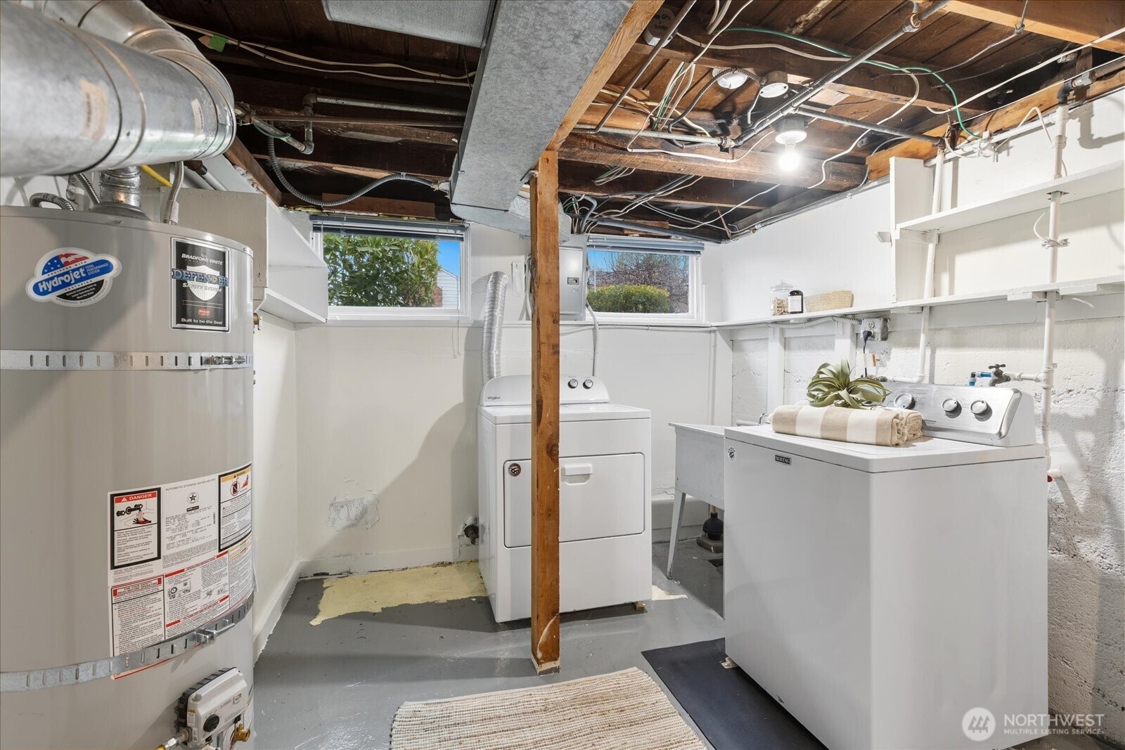 2857 Northwest 73rd Street Seattle, WA 98117 - Photo 14 of 25 a utility room with dryer and washer